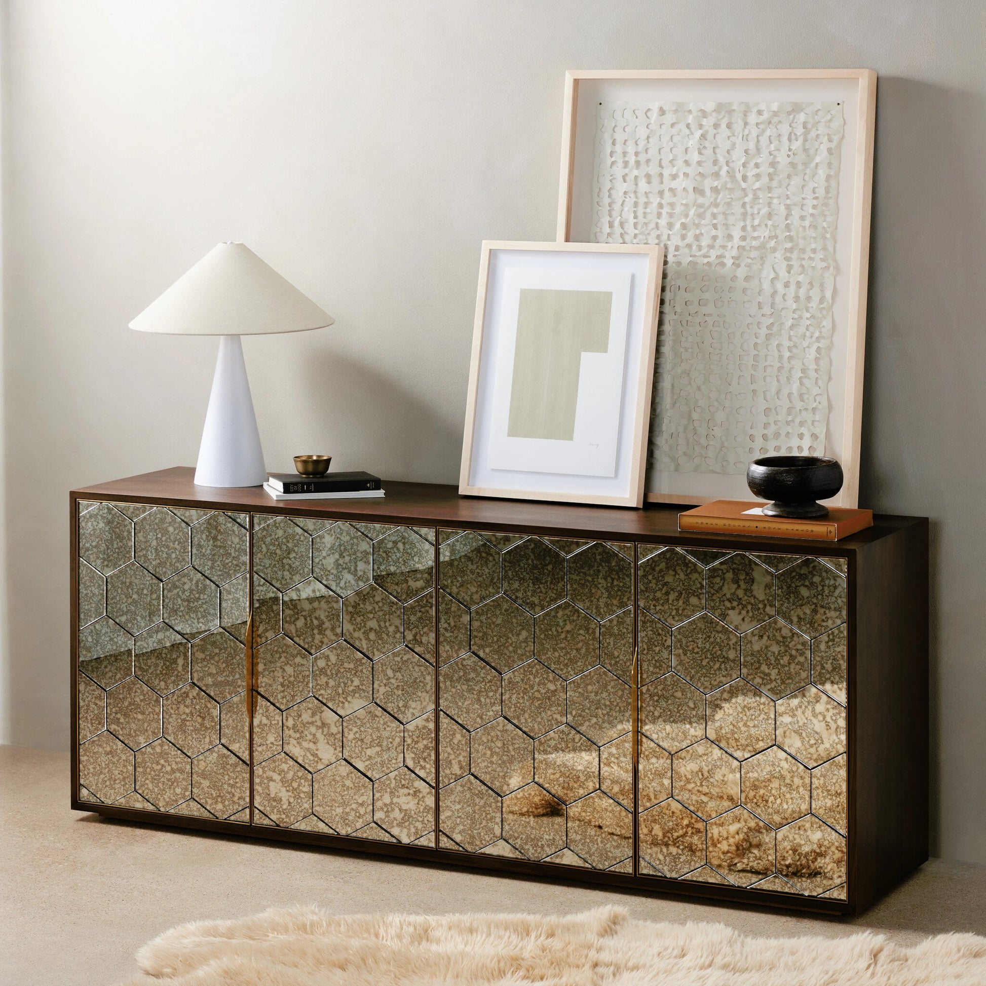 Cybil Sideboard by Four Hands in dark walnut. Made from walnut veneer, stainless steel, glass in a eclectic & global style.