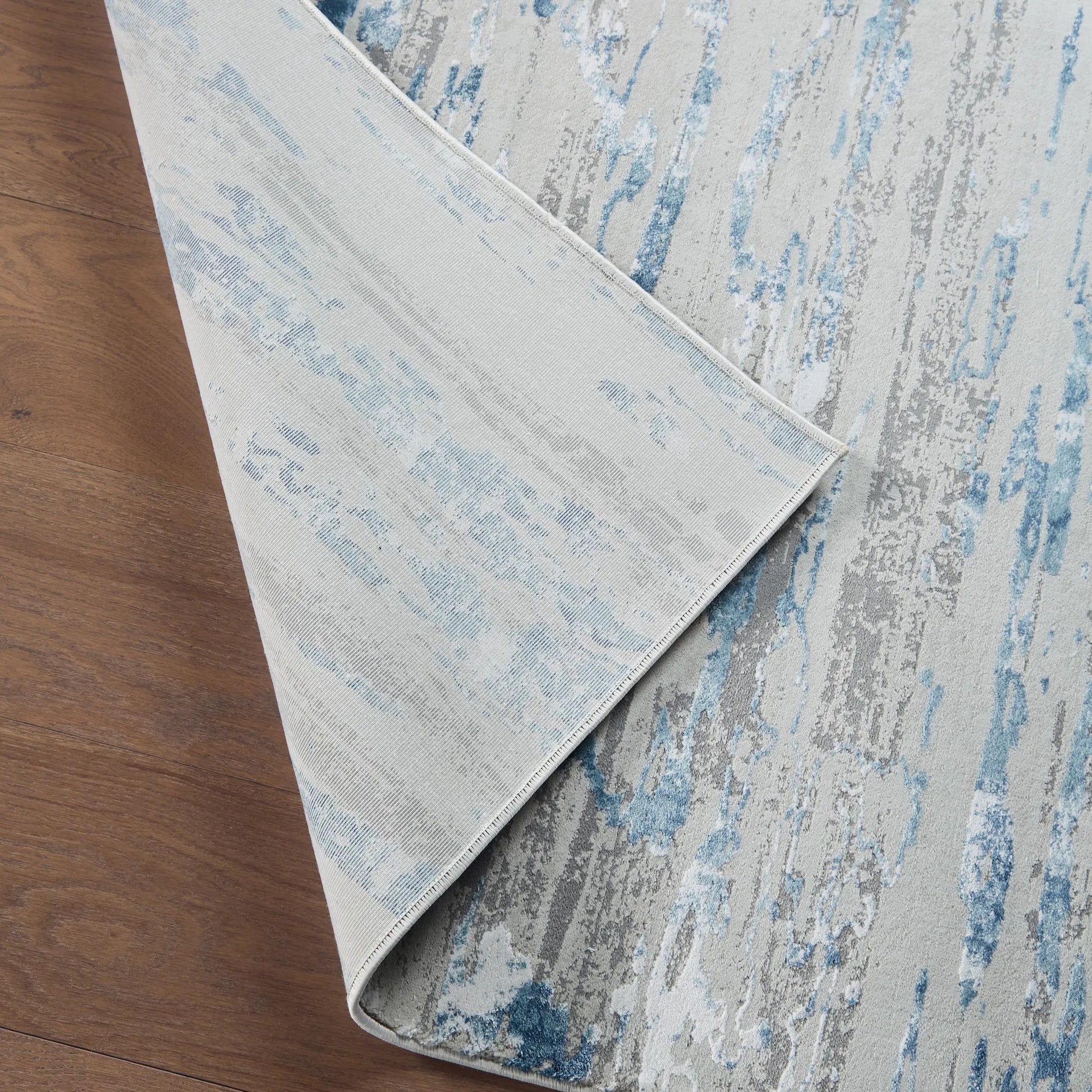 Cirque CIQ25 Rug by Jaipur Living in ivory, blue. Made from unique in a unique style.