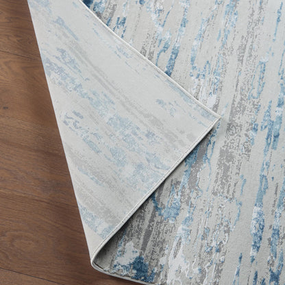 Cirque CIQ25 Rug by Jaipur Living in ivory, blue. Made from unique in a unique style.