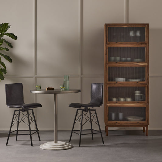 Diaw Counter Stool by Four Hands in waxed black, rialto ebony and rialto ebony. Made from top grain leather, iron, faux leather in a modern style.