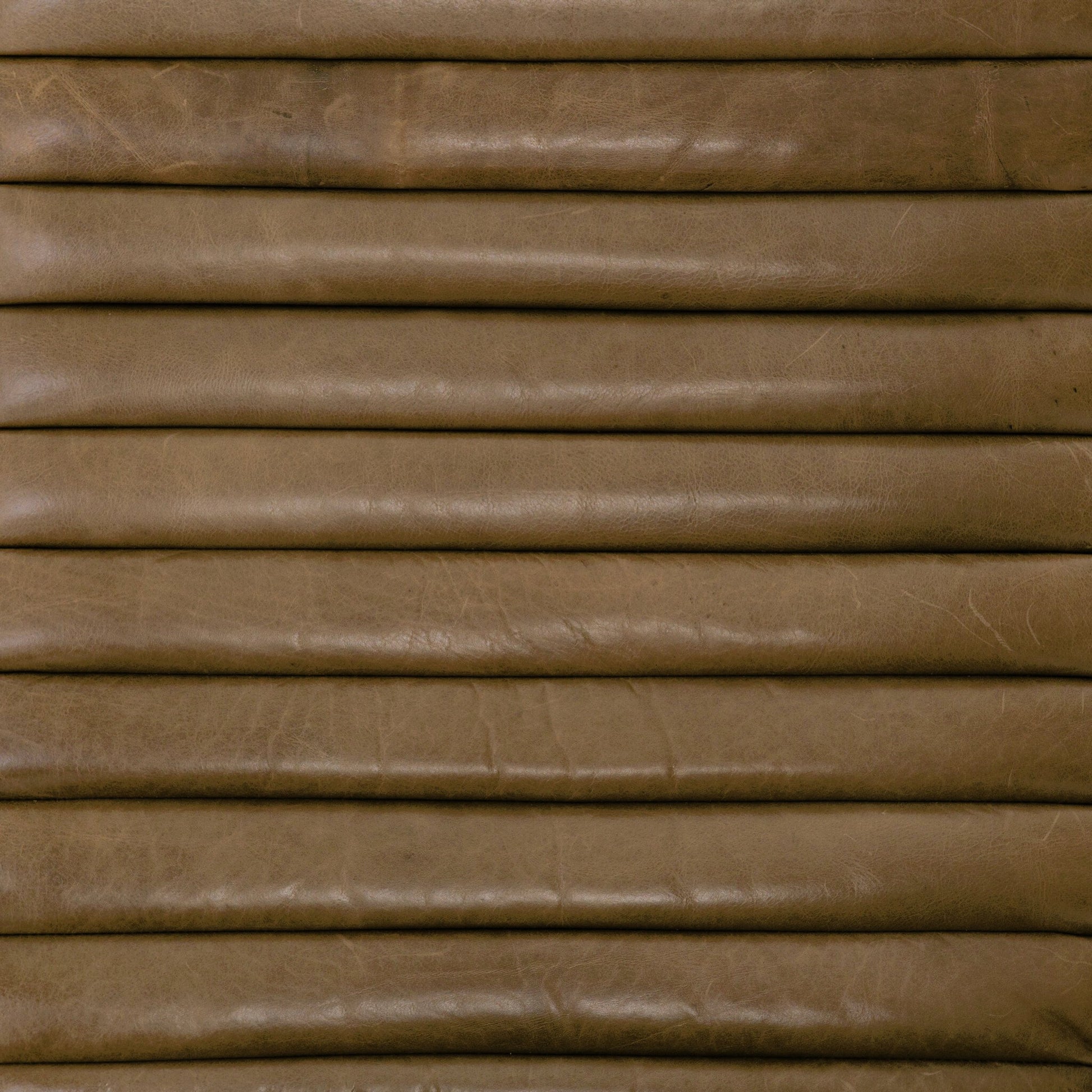 Chance Chair by Four Hands in dakota warm taupe, rubbed sienna brown. Made from top grain leather, solid parawood, 100% polyester in a modern style.