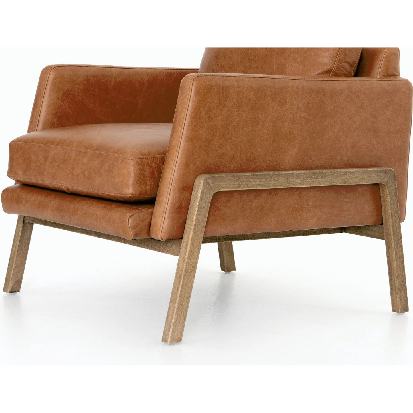 021 SR-809860 | Closeup | Diana Chair by Four Hands in sonoma butterscotch. Made from top grain leather, solid parawood, 100% polyester in a modern style.