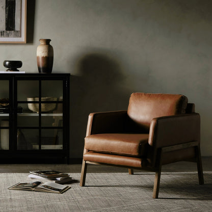 Diana Chair by Four Hands in sonoma butterscotch. Made from top grain leather, solid parawood, 100% polyester in a modern style.