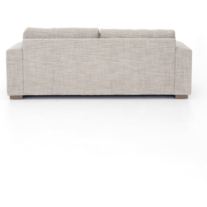 Boone Sofa by Four Hands in washed espresso. Made from 66% polyester, 19% acrylic, 15% flax, linen, solid parawood, 100% polyester in a modern style.