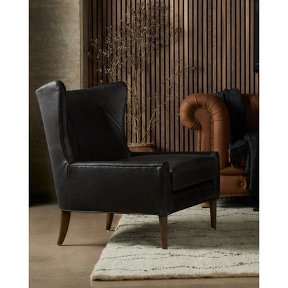 Marlow Wing Chair by Four Hands. Made from top grain leather, solid parawood, 100% polyester in a modern style.