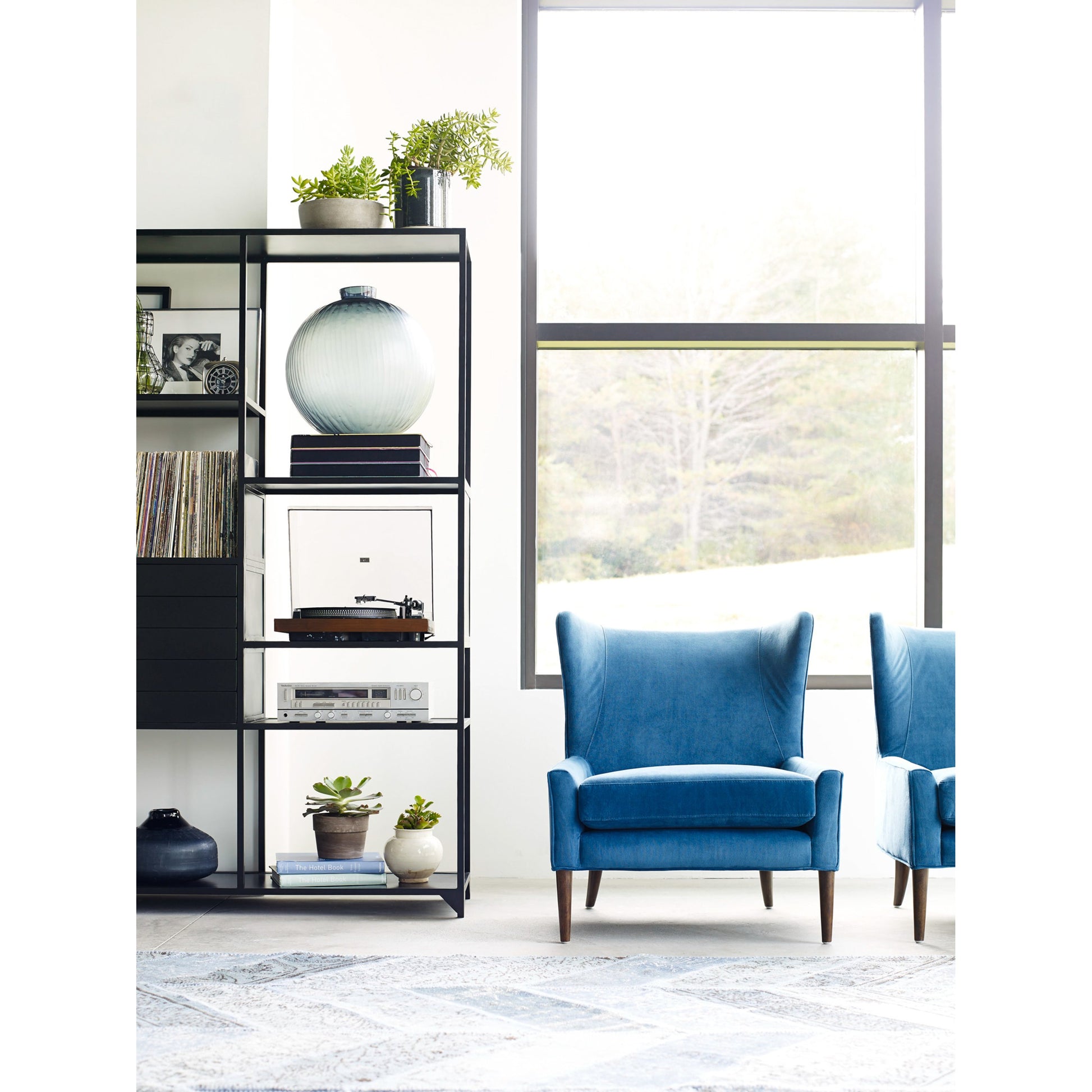 Marlow Wing Chair by Four Hands. Made from top grain leather, solid parawood, 100% polyester in a modern style.