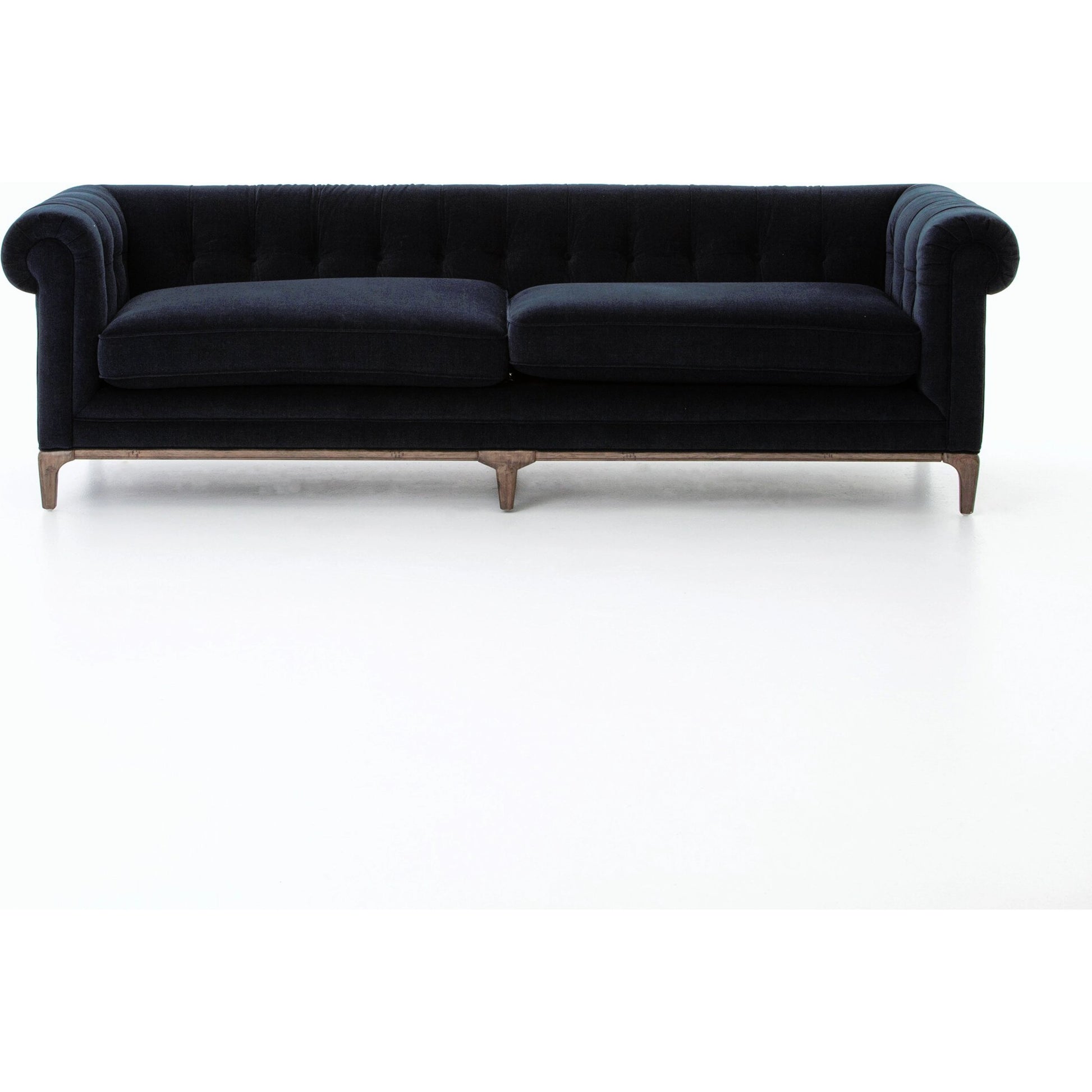 Griffon Sofa by Four Hands in plush navy and plush navy, antique walnut. Made from 100% polyester, solid parawood in a modern style.