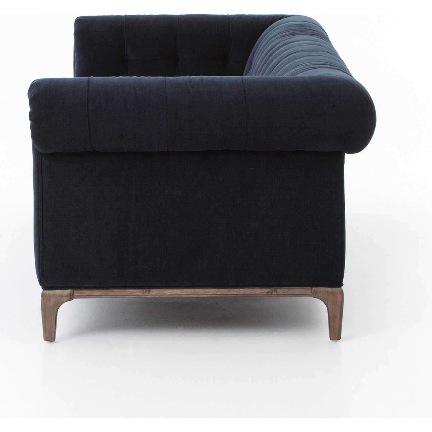 007 S-258325 | Additional Silo | Griffon Sofa by Four Hands in plush navy and plush navy, antique walnut. Made from 100% polyester, solid parawood in a modern style.