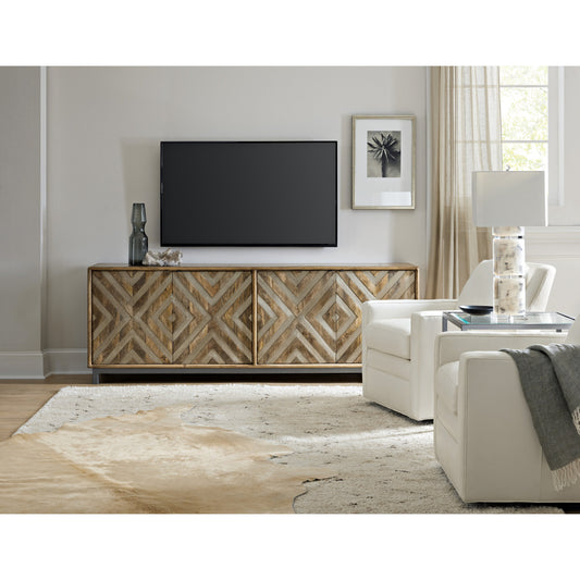 Four Door Entertainment Console by Hooker Furniture. Made from mango wood, iron, german silver in a modern style.