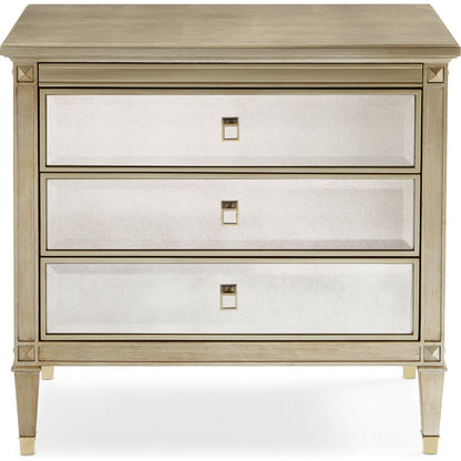 A Classic Beauty Chest by Caracole in silver and auric, gold bullion paint. Made from birch, maple, pine in a traditional style.
