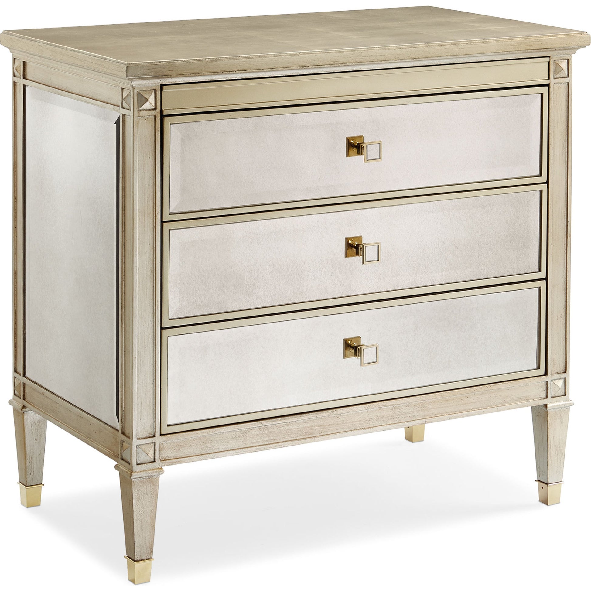 A Classic Beauty Chest by Caracole in silver and auric, gold bullion paint. Made from birch, maple, pine in a traditional style.