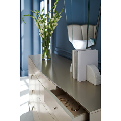 Dress To Impress Dresser by Caracole in silver, cream and soft silver, vanilla cream. Made from asian hardwood, metal, figured sycamore in a transitional style.