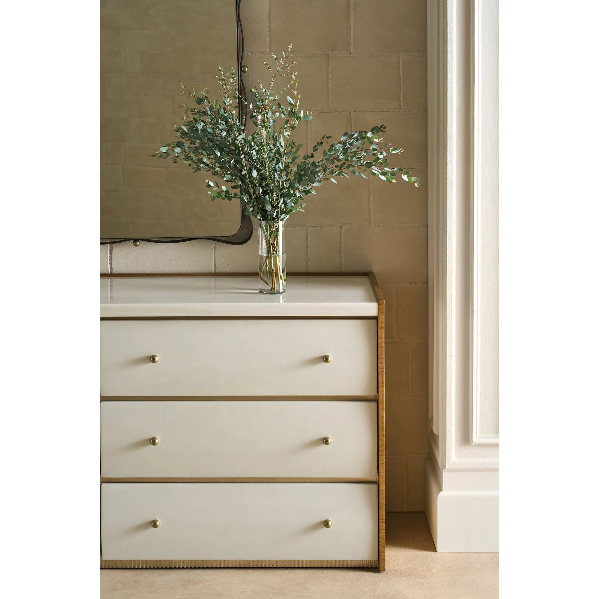 Avignon Dresser by Caracole in burnished adobe, toasted sycamore, antique bronze leaf. Made from acacia, stone, sycamore in a transitional style.