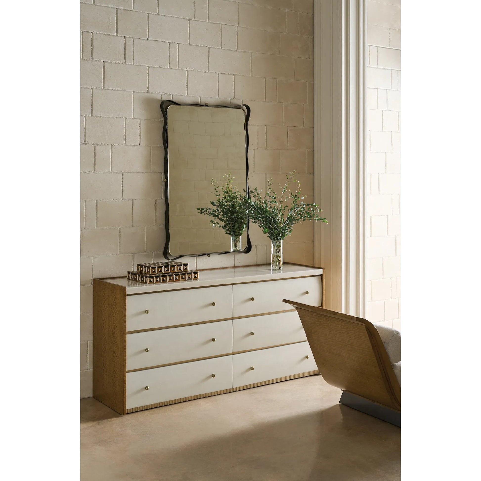 Avignon Dresser by Caracole in burnished adobe, toasted sycamore, antique bronze leaf. Made from acacia, stone, sycamore in a transitional style.