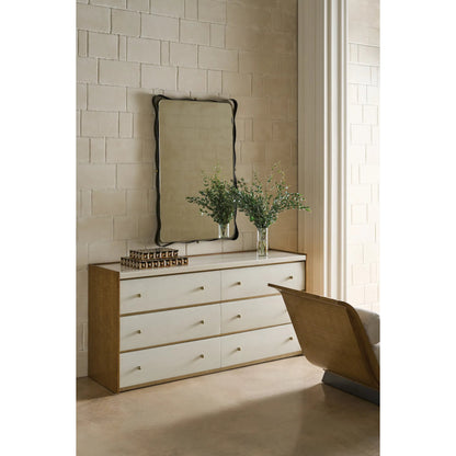 Avignon Dresser by Caracole in burnished adobe, toasted sycamore, antique bronze leaf. Made from acacia, stone, sycamore in a transitional style.