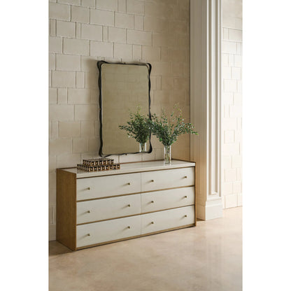 Avignon Dresser by Caracole in burnished adobe, toasted sycamore, antique bronze leaf. Made from acacia, stone, sycamore in a transitional style.