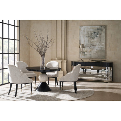 Chalice Dining Table by Caracole in almost black, brushed gold. Made from asian hardwood, acacia, glass, ceramic, metal in a modern style.