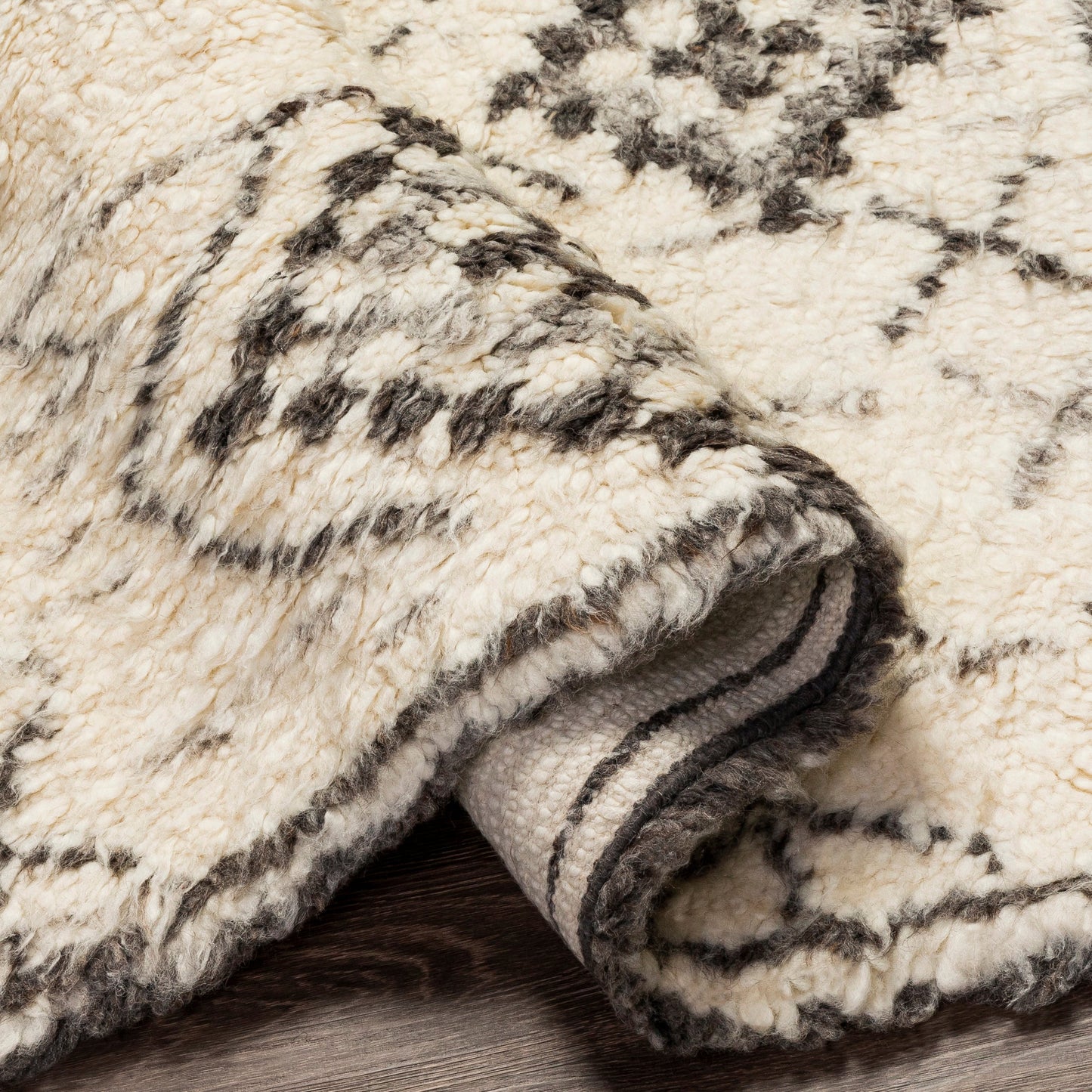 005 SI-1878674,SI-1878675,SI-1878677 | Closeup | Camille Rug - 27015 by Surya in cream, medium gray, black. Made from 100% new zealand wool in a unique style.