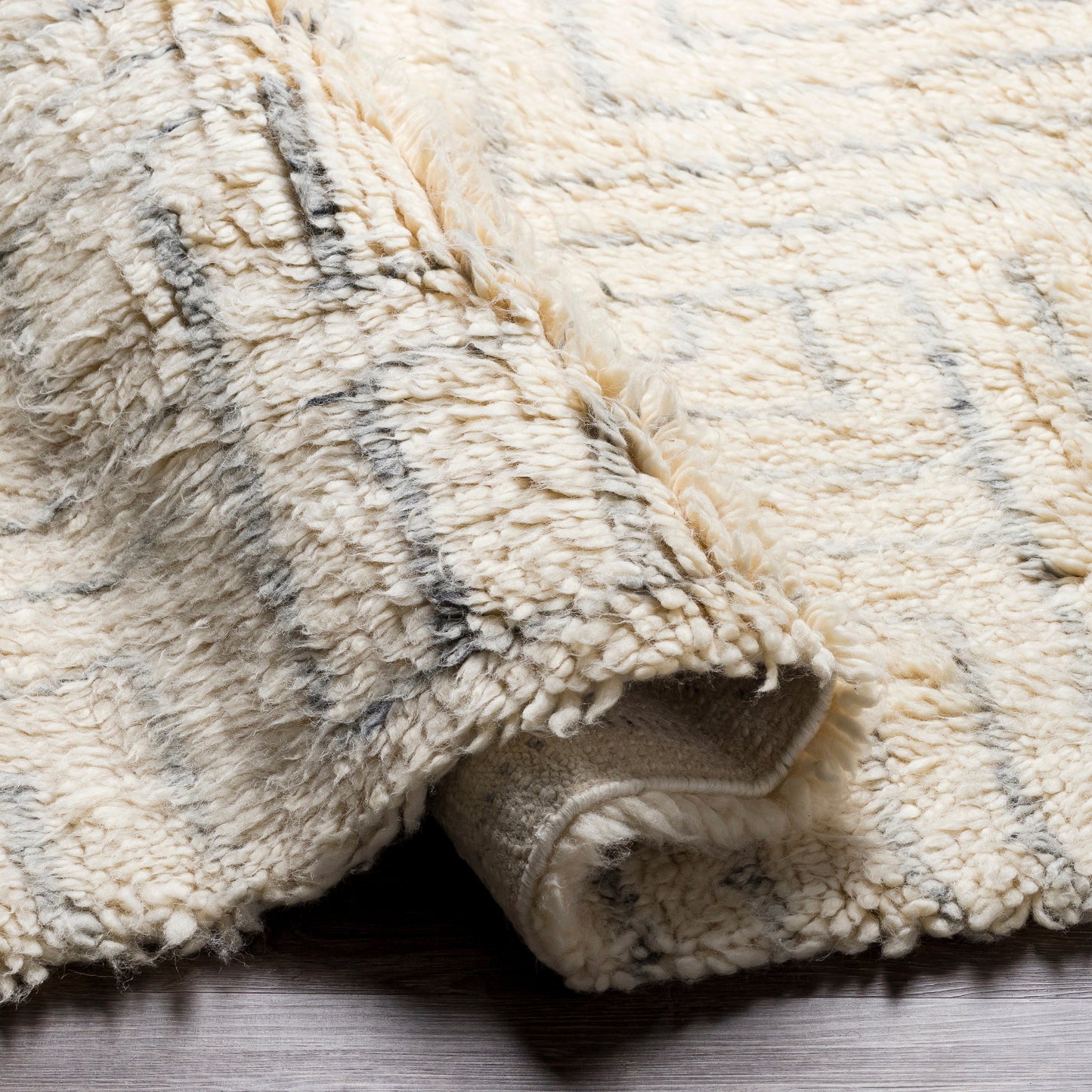 006 SI-1878662,SI-1878663 | Closeup | Camille Rug - 27012 by Surya in cream, medium gray, black. Made from 100% new zealand wool in a unique style.