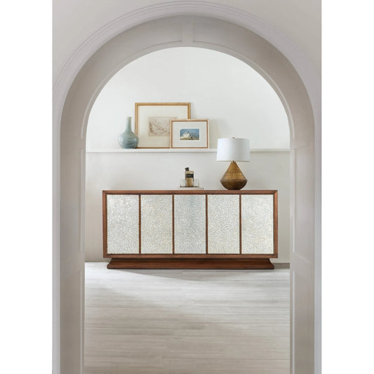 Melange Lloyds Leopard Entertainment Credenza by Hooker Furniture in walnut veneers, silver painted glass front doors. Made from unique in a unique style.