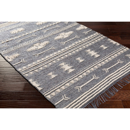 Cheyenne Naturals CNA-2300 Rug by Surya in aqua, brown, navy, cream. Made from 60% jute, 30% wool, 10% polyester in a unique style.
