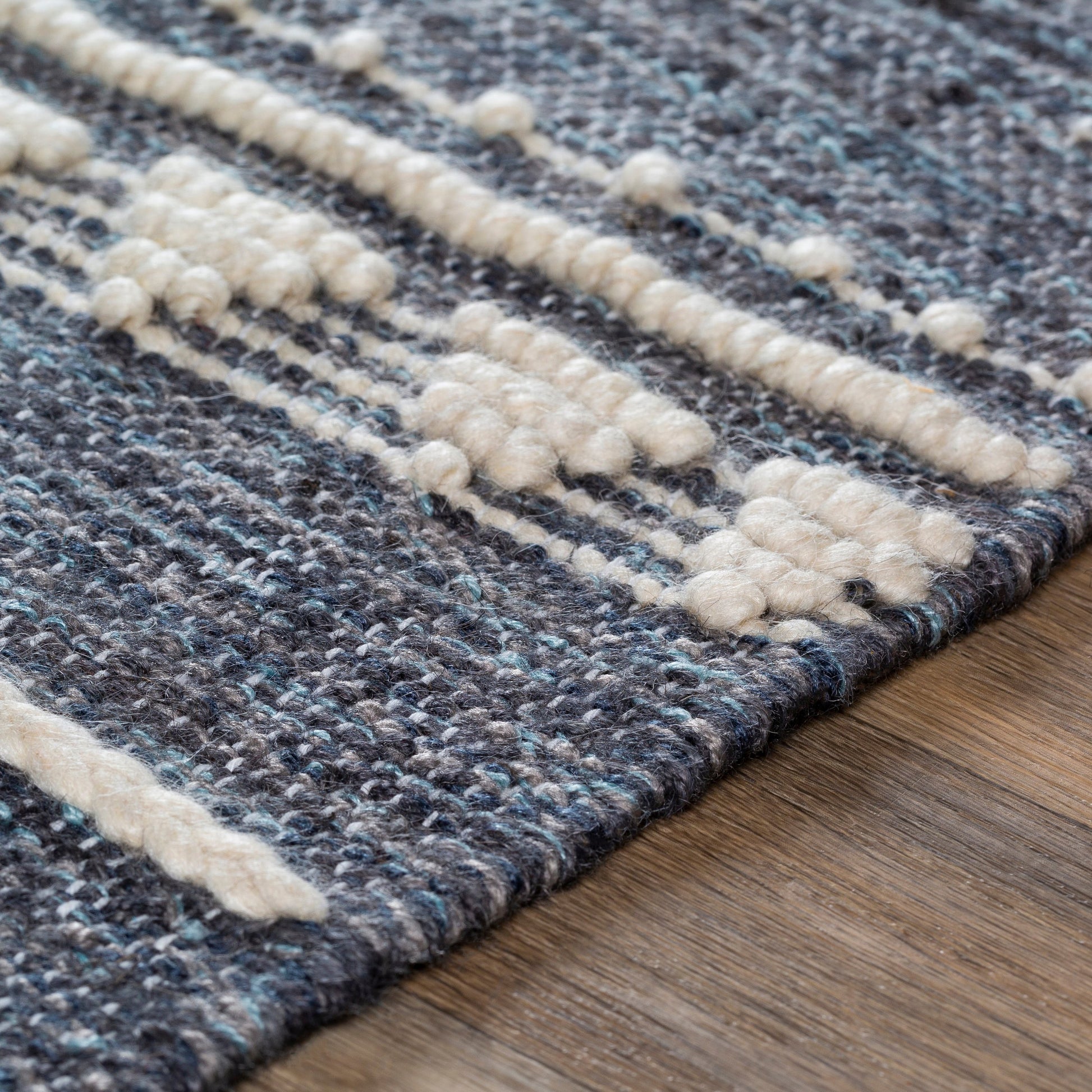 Cheyenne Naturals CNA-2300 Rug by Surya in aqua, brown, navy, cream. Made from 60% jute, 30% wool, 10% polyester in a unique style.