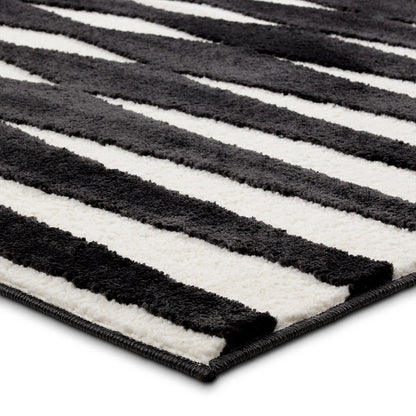 Calix By Nikki Chu Apyre CNU01 Rug by Jaipur Living in black, white. Made from 70% polypropylene 30% polyester in a unique style.