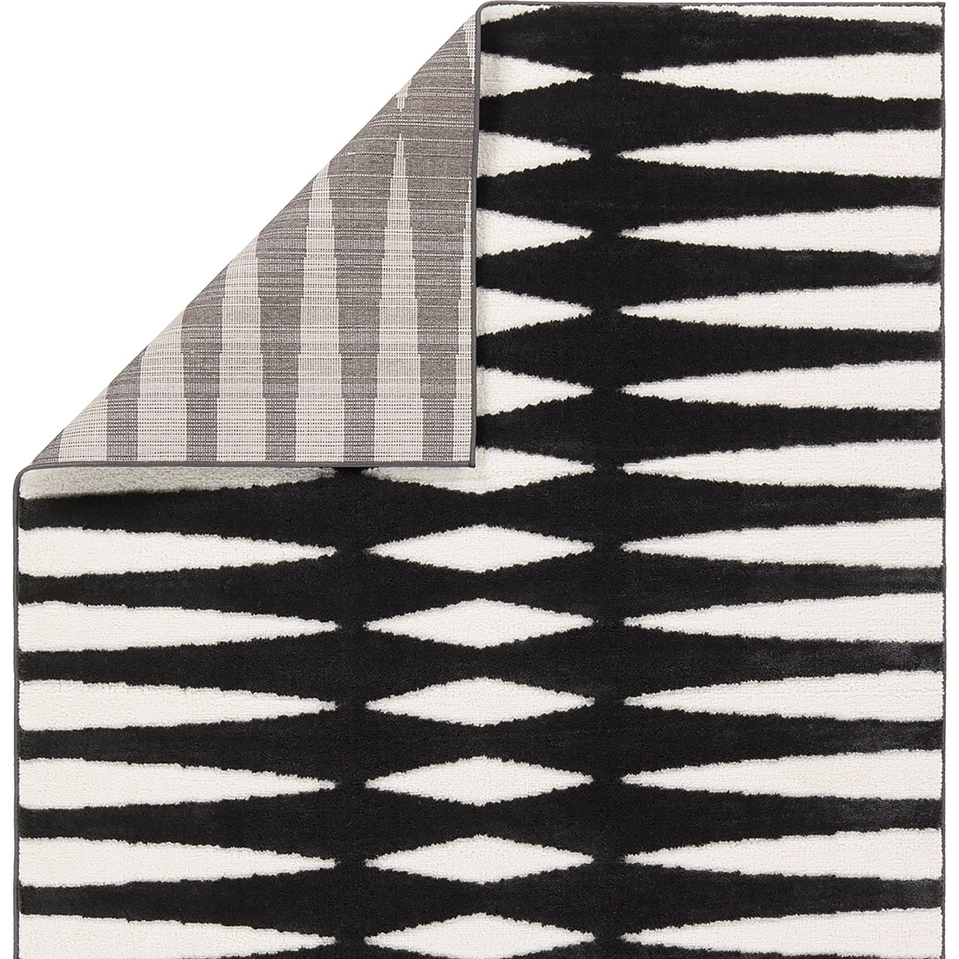 Calix By Nikki Chu Apyre CNU01 Rug by Jaipur Living in black, white. Made from 70% polypropylene 30% polyester in a unique style.
