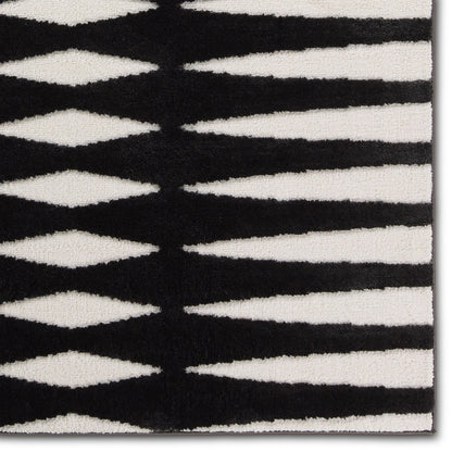 Calix By Nikki Chu Apyre CNU01 Rug by Jaipur Living in black, white. Made from 70% polypropylene 30% polyester in a unique style.