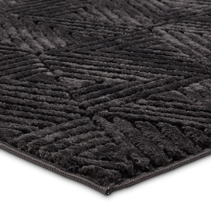 Calix by Nikki Chu CNU04 Rug by Jaipur Living in black. Made from 70% polypropylene 30% polyester in a unique style.