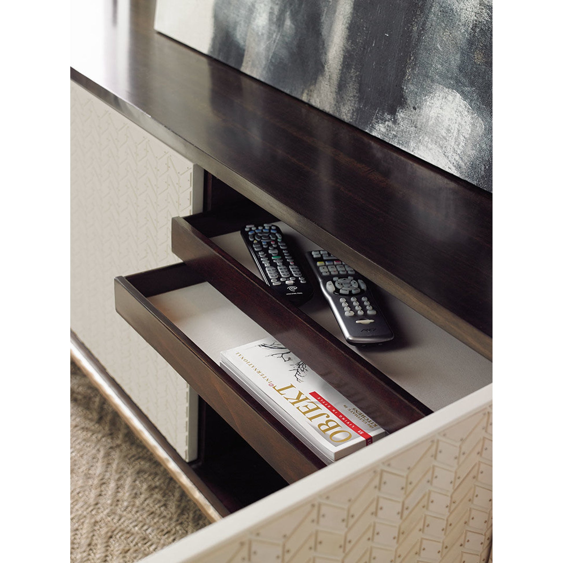 For Your Viewing Pleasure Cabinet by Caracole in bone and french roast, gold bullion paint. Made from fumed eucalyptus, hardwoods in a transitional style.