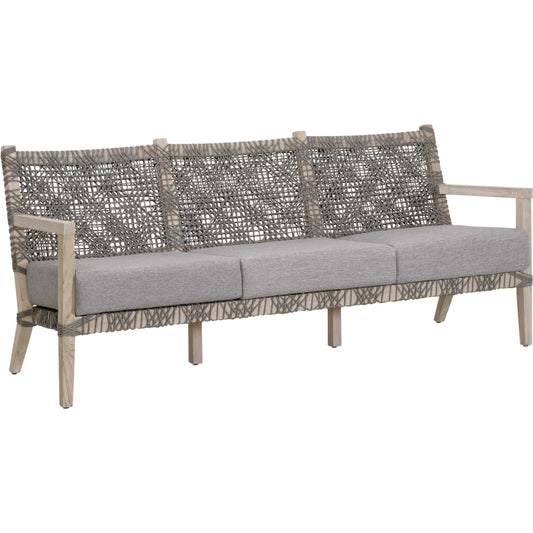 Costa Sofa by Essentials For Living in gray teak, performance dove. Made from solid teak wood, polyolefin rope, 100% olefin fabric, foam in a coastal style.