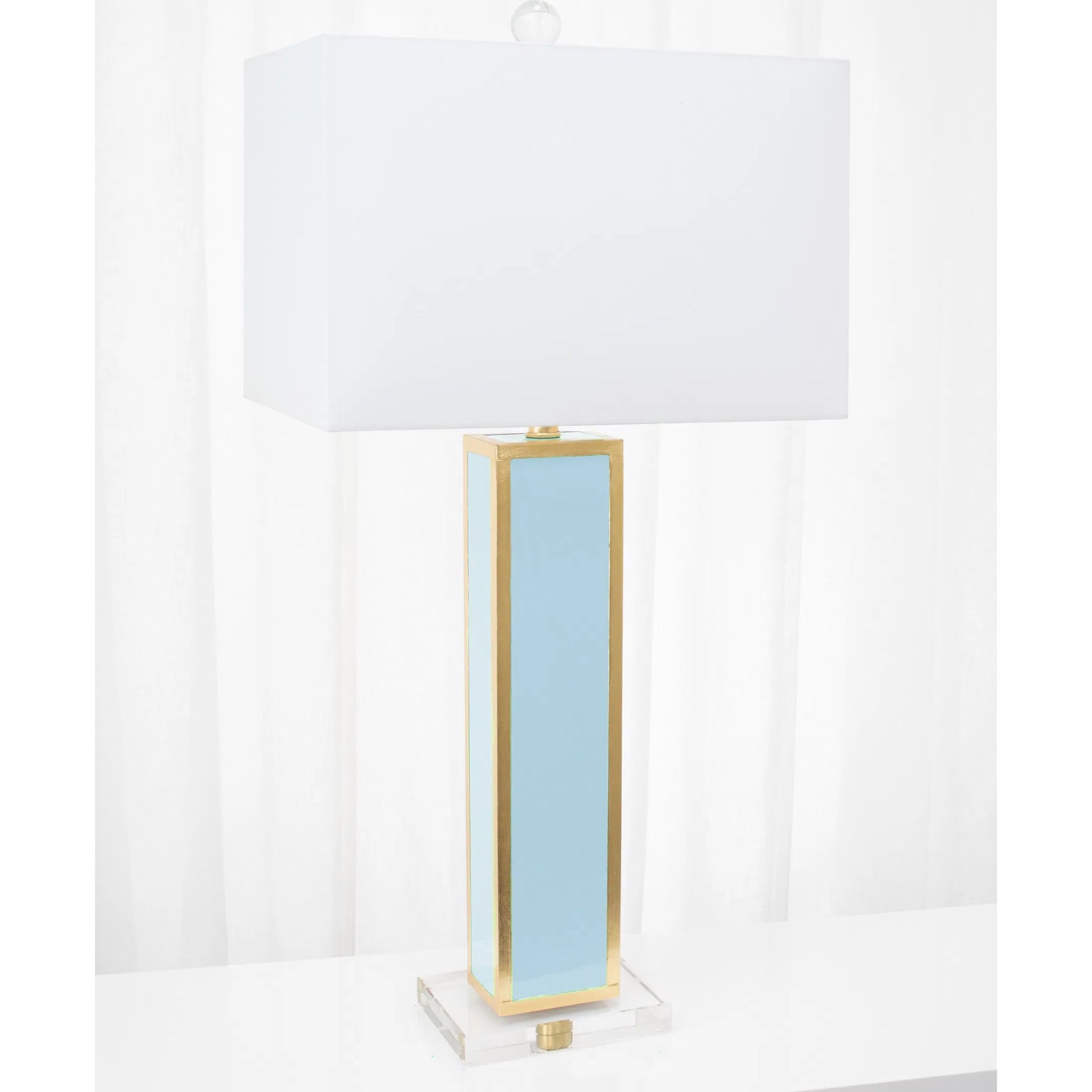 Blair Table Lamp by Couture Lamps in calypso blue, silver leaf. Made from resin, mdf, crystal, linen in a unique style.