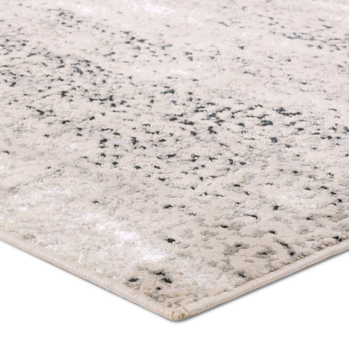 002 SI-2077458,SI-2077459,SI-2077460,SI-2077461,SI-2077462,SI-2077463 | Closeup | Catalyst Faizah Rug by Jaipur Living in cream, gray. Made from 65% polyester 35% polypropylene in a unique style.