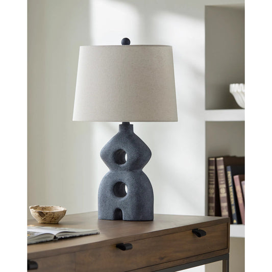 Cueli Accent Table Lamp by Livabliss in body: black; shade: white; finial: black; harp: metallic - nickel; cord: translucent and paintedplated. Made from resin, linen, polyester in a unique style.