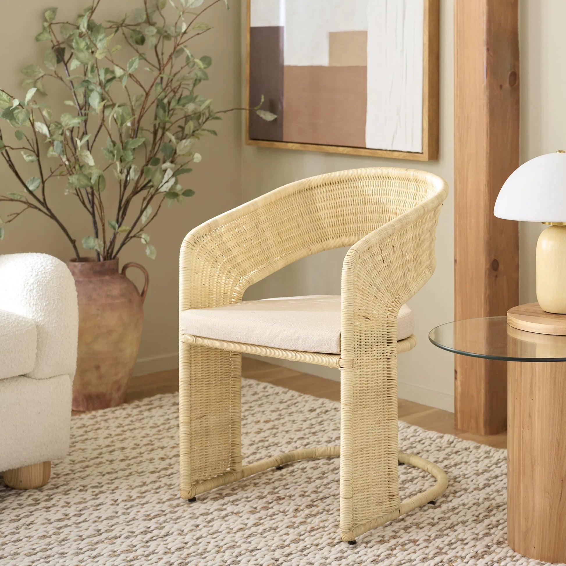 Lees Rattan Dining Chair by HedgeApple Essentials in natural, white. Made from rattan, iron, performance linen (100% polyester), foam (eon white d23) in a rustic style.