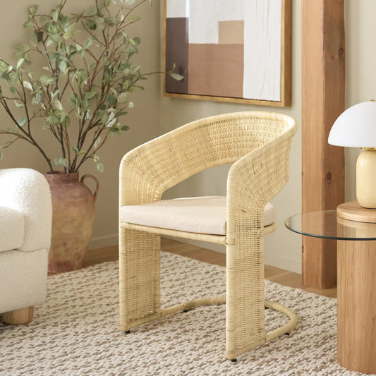 Lees Rattan Dining Chair by HedgeApple Essentials in natural, white. Made from rattan, iron, performance linen (100% polyester), foam (eon white d23) in a rustic style.