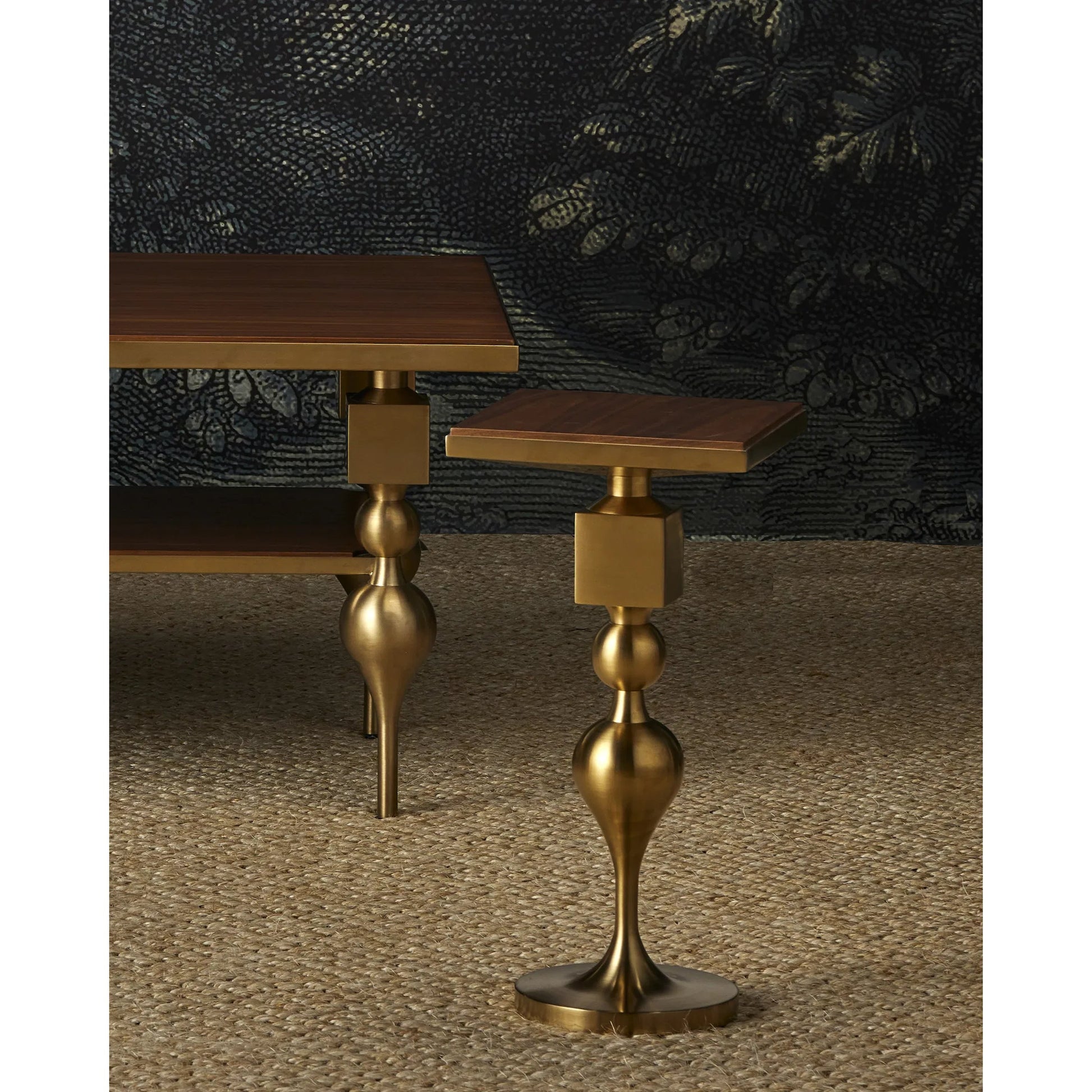 Maeve Cocktail Table by Currey and Company in brushed brass, walnut. Made from stainless steel, walnut veneer, engineered wood in a modern style.