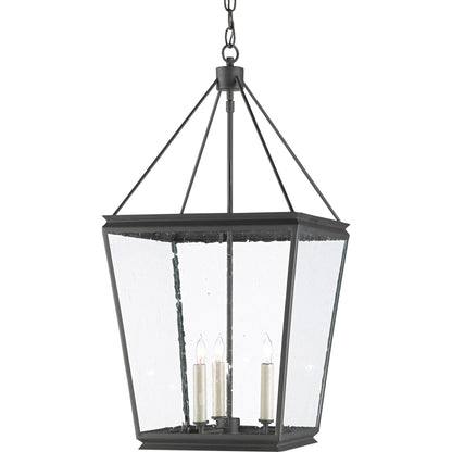 Ellerman Lantern by Currey and Company in old iron. Made from wrought iron, seeded glass in a transitional style.