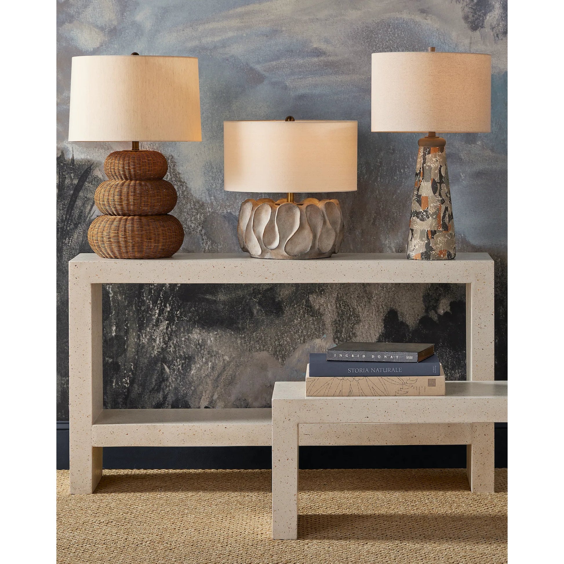 Carson Console Table by Currey and Company in ivory terrazzo. Made from fiber concrete, stone, shell in a transitional style.