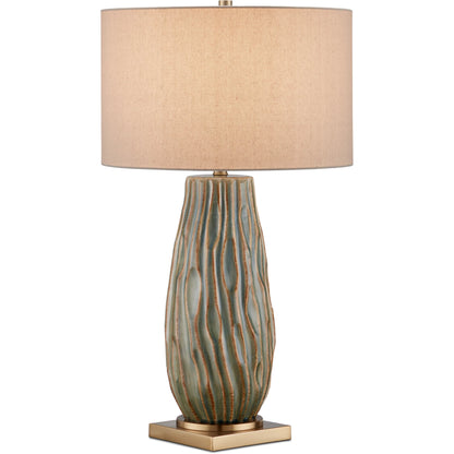 Water-Borne Table Lamp by Currey and Company in forest reactive, antique brass. Made from ceramic, metal in a modern style.