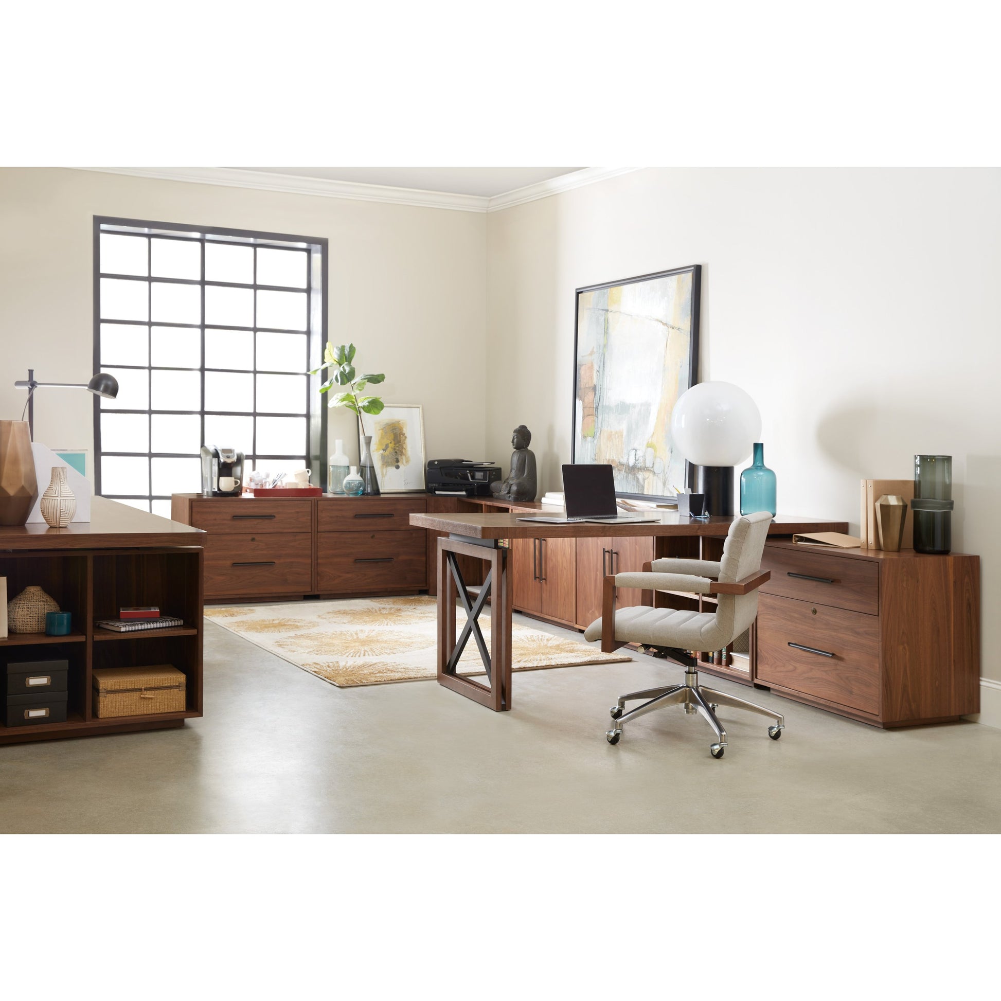 Elon Cabinet by Hooker Furniture in walnut. Made from flat cut walnut veneers in a traditional style.