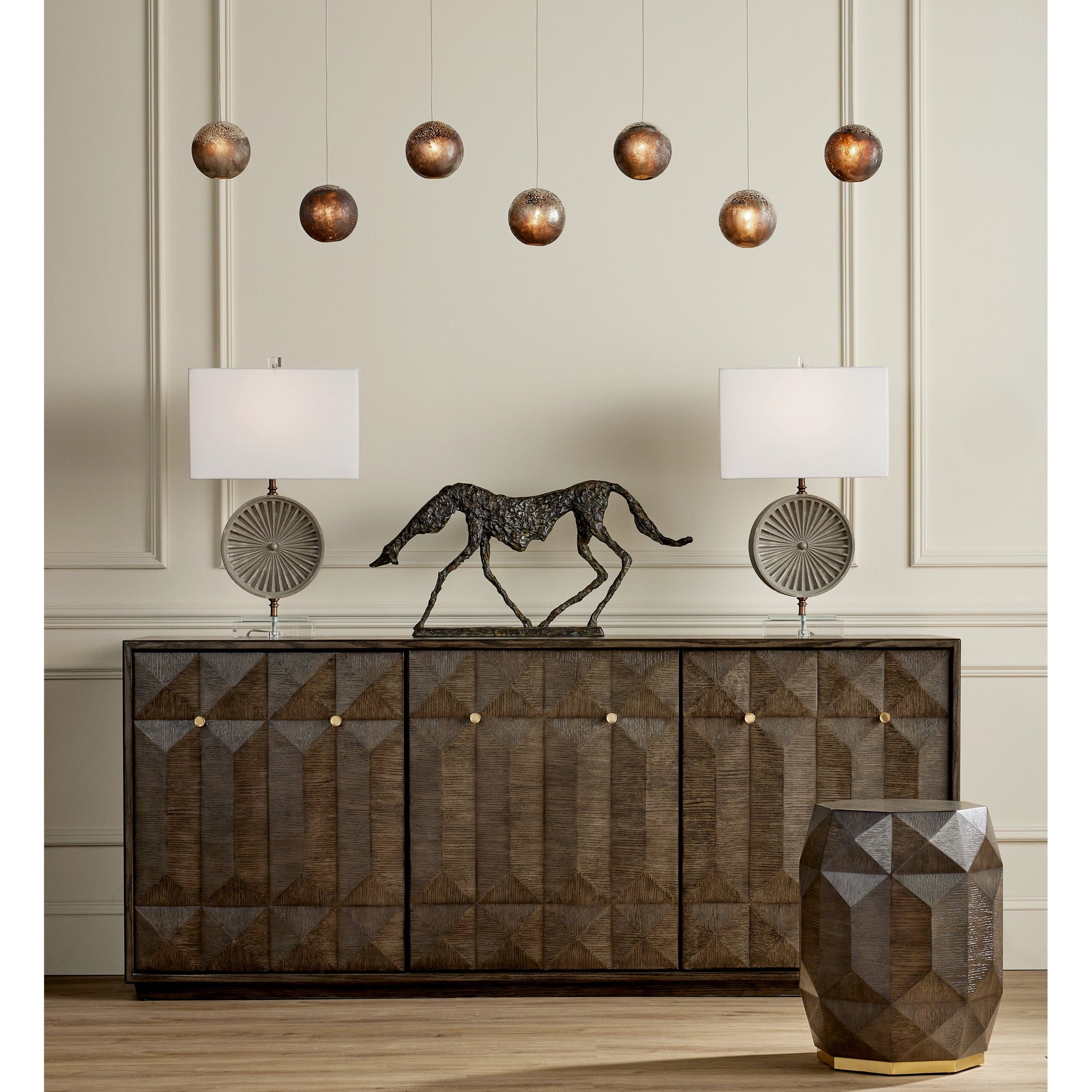 Kendall Credenza by Currey and Company in dove gray, polished brass. Made from oak solids, veneers, brass in a transitional style.