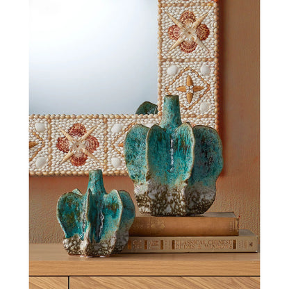 Junonia Mirror by Currey and Company in natural. Made from shell, wood, glass in a eclectic & global style.