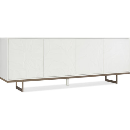 Melange Passerine Four Door Credenza by Hooker Furniture in white. Made from hardwoods with resin, metal in a modern style.
