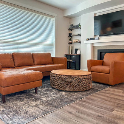 Cooper Swivel Club Chair by LH Imports in matte black. Made from pine, hardwood, metal, pu foam, polyester in a modern style.