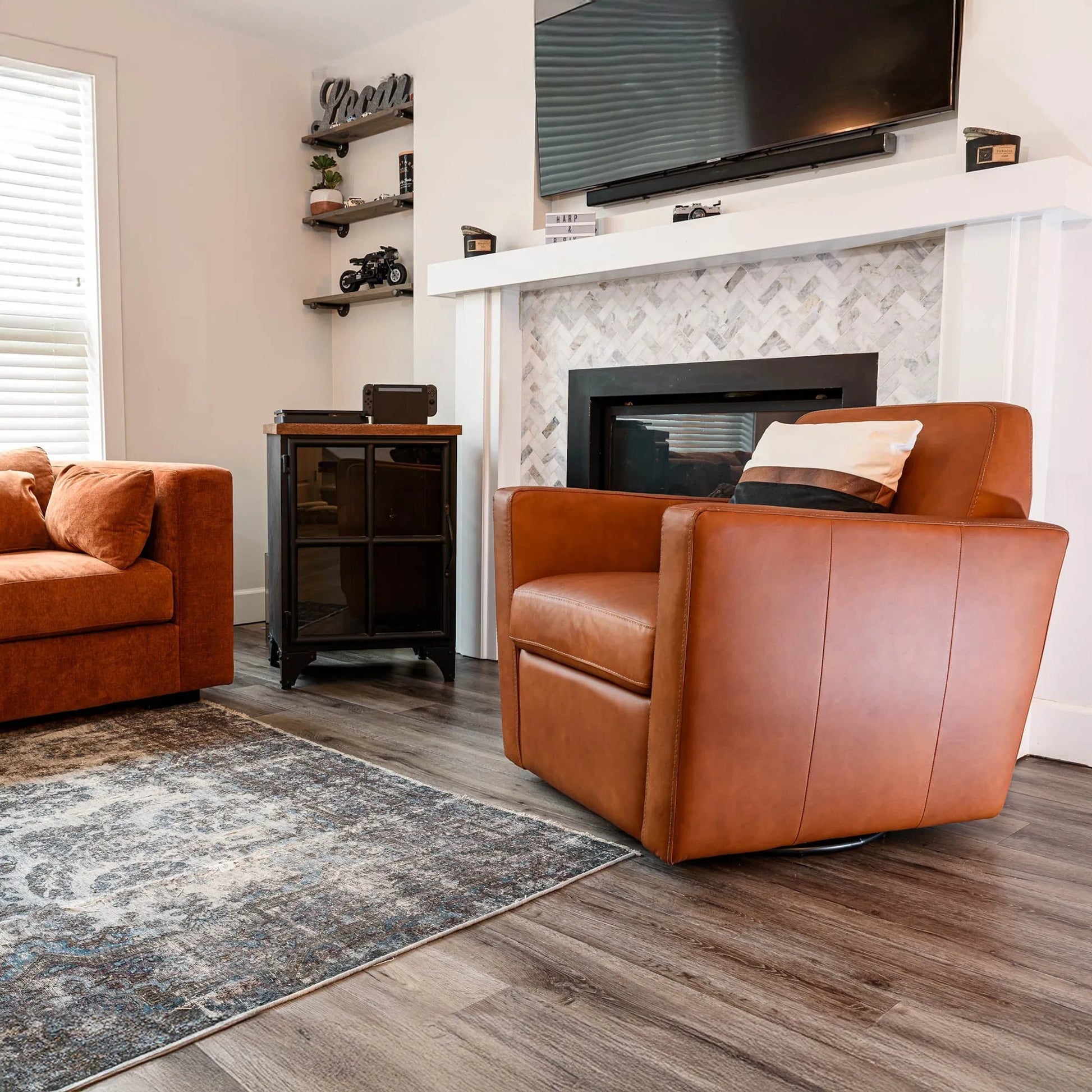 Cooper Swivel Club Chair by LH Imports in matte black. Made from pine, hardwood, metal, pu foam, polyester in a modern style.