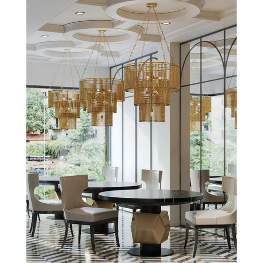 Mantra Chandelier by Currey and Company in gold leaf. Made from iron, brass in a modern style.