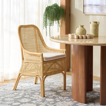 Ward Dining Chair with Cushion by HedgeApple Essentials. Made from rattan, 60% cotton, 40% polyester in a unique style.