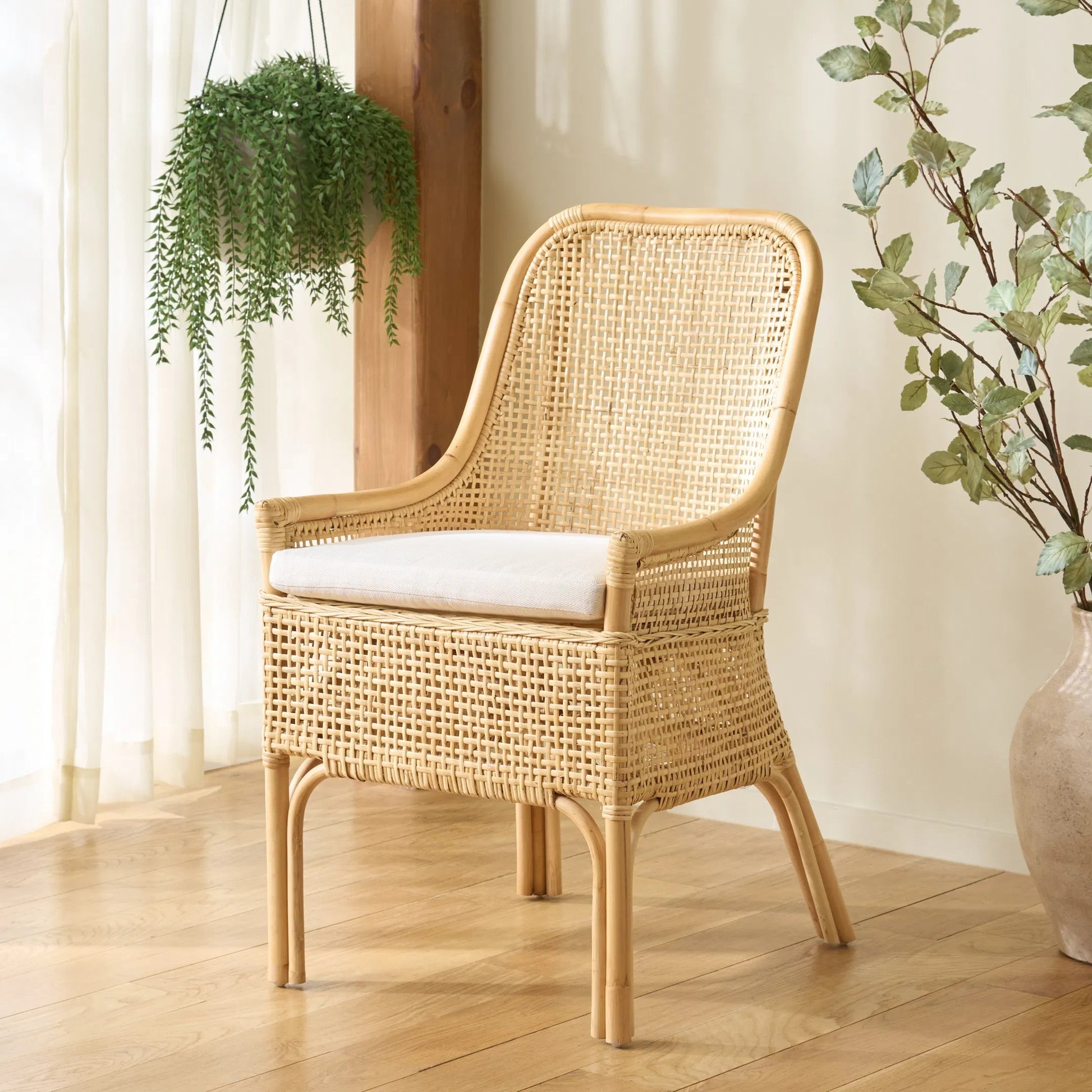 Ward Dining Chair with Cushion by HedgeApple Essentials. Made from rattan, 60% cotton, 40% polyester in a unique style.